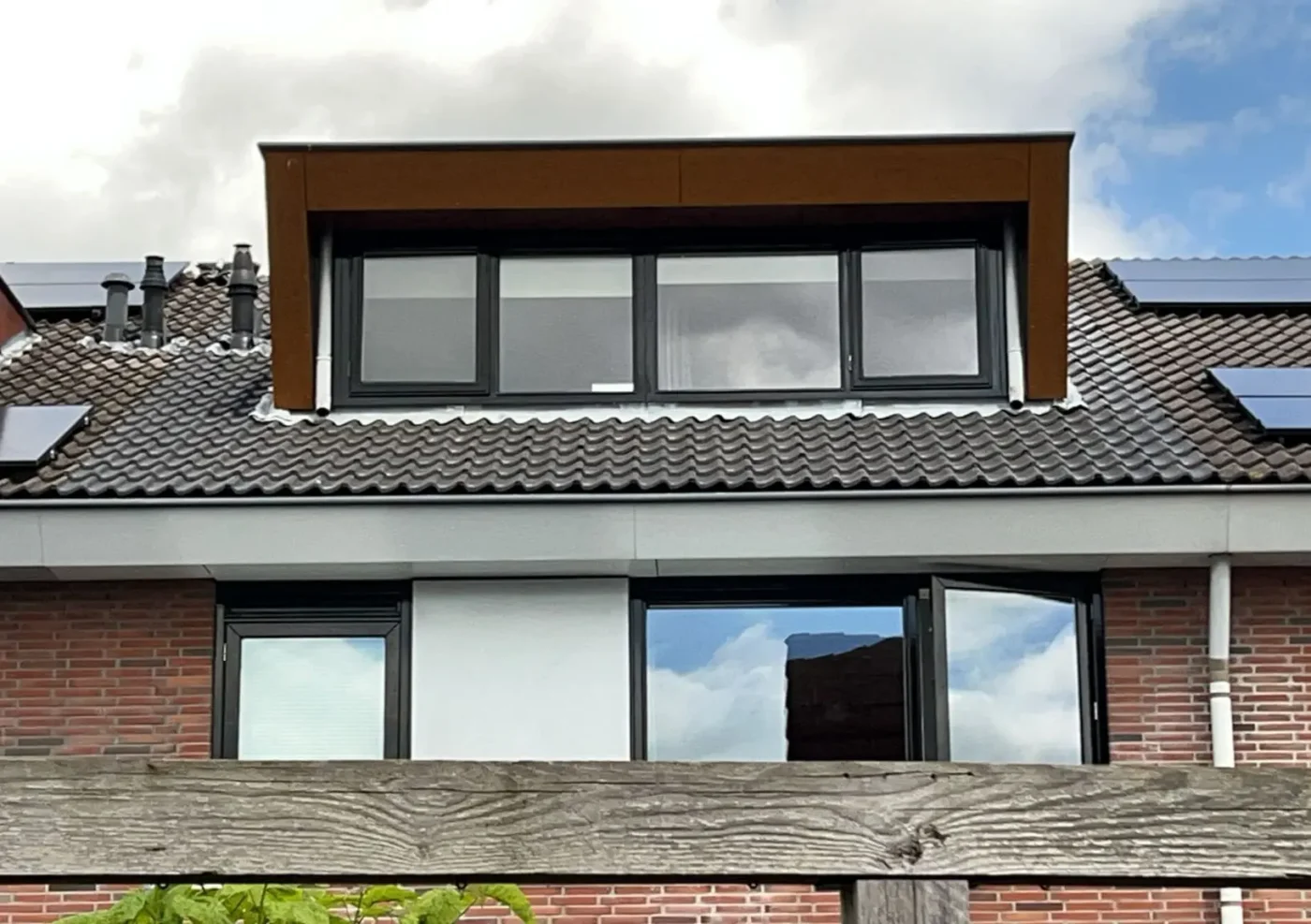 Renovatie bitumendakkapel met Trespa afwerking